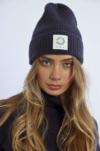 Rib Cuffed Knit Beanie

Lili Sidonio brand patch

Orange or Navy